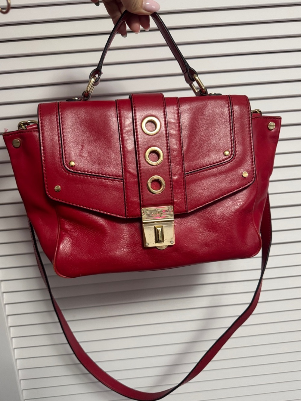 Milly Red Leather handbag Top-Handle with Gold-tone grommet accents
